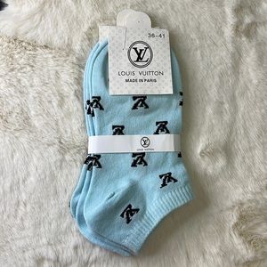 Louis Vuitton. Two pair, light blue no-show socks with logo. Size 36-41. NWT